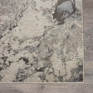 Photo of 10' Gray Beige and Ivory Abstract Non Skid Runner Rug