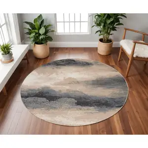 Photo of 8' Gray Black and Beige Abstract Non Skid Round Rug