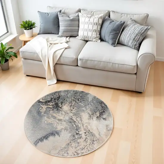 4' Gray Black and Ivory Abstract Round Rug Photo 1