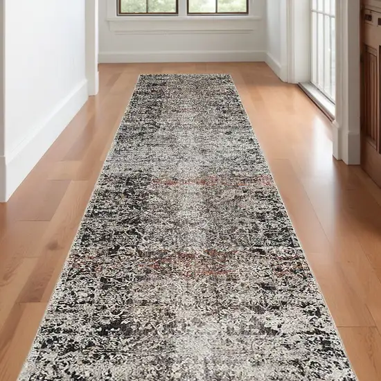 10' Gray Black and Red Oriental Power Loom Distressed Runner Rug With Fringe Photo 1