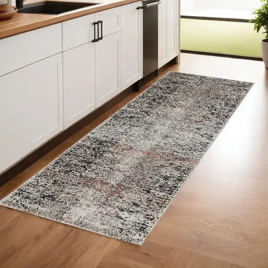 8' Gray Black and Red Oriental Power Loom Distressed Runner Rug With Fringe Photo 1