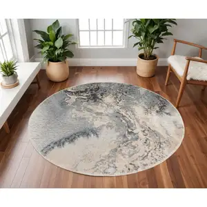 Photo of 5' Gray Blue and Ivory Abstract Round Rug