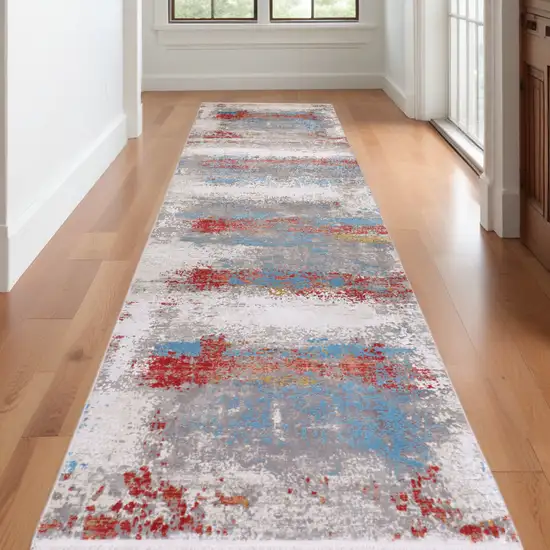 10' Gray Blue and Red Abstract Power Loom Runner Rug With Fringe Photo 1