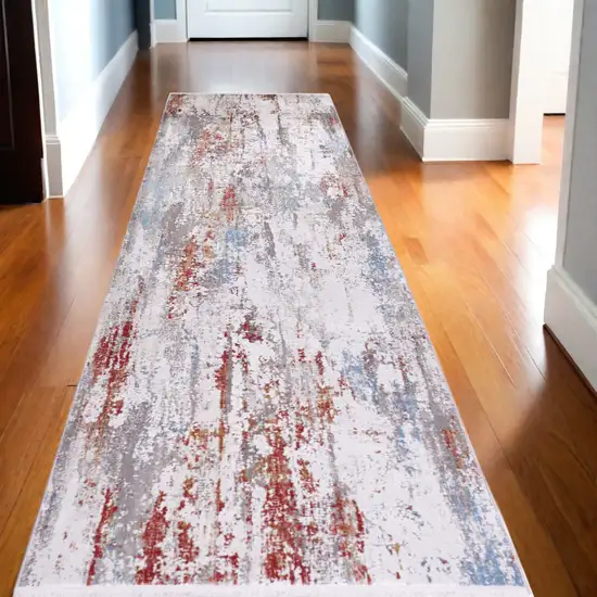 10' Gray Blue and Red Abstract Power Loom Runner Rug With Fringe Photo 1