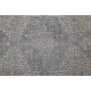 Photo of 8' Gray Blue and Taupe Oriental Power Loom Worn Faded Runner Rug With Fringe