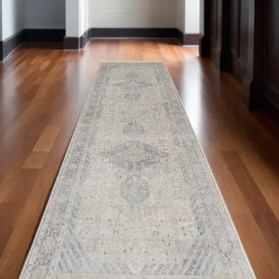 12' Gray Blue and Taupe Oriental Power Loom Worn Faded Runner Rug With Fringe Photo 1