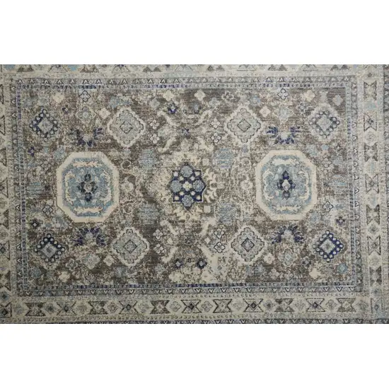 8' Gray Brown And Blue Round Floral Stain Resistant Area Rug Photo 3