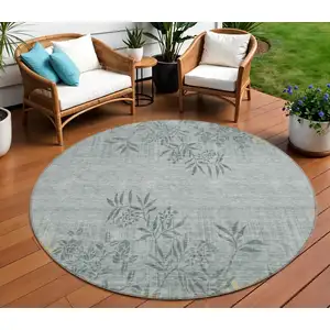 Photo of 8' Gray Charcoal And Gold Round Floral Washable Indoor Outdoor Area Rug