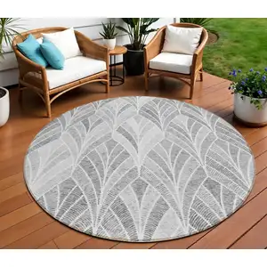 Photo of 8' Gray Charcoal And Ivory Round Geometric Washable Indoor Outdoor Area Rug