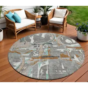 Photo of 8' Gray Copper And Mint Green Round Geometric Washable Indoor Outdoor Area Rug