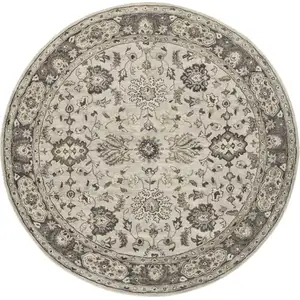 Photo of 8' Gray Ivory And Taupe Round Wool Floral Tufted Handmade Stain Resistant Area Rug