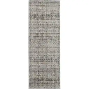 Photo of 8' Gray Ivory and Blue Abstract Power Loom Worn Faded Runner Rug With Fringe