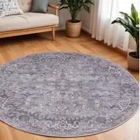 Photo of 8' Gray Round Floral Power Loom Distressed Area Rug