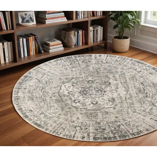 8' Medium Gray and Ivory Medallion Power Loom Round Rug Photo 1