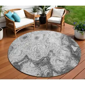 Photo of 8' Gray Silver And Charcoal Round Abstract Washable Indoor Outdoor Area Rug