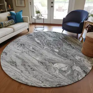 Photo of 8' Gray Silver And Charcoal Round Abstract Washable Indoor Outdoor Area Rug