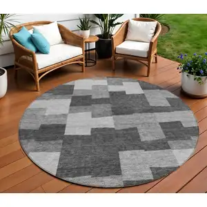 Photo of 8' Gray Silver And Charcoal Round Geometric Washable Indoor Outdoor Area Rug