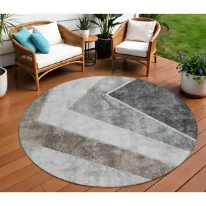 Photo of 8' Gray Silver And Charcoal Round Geometric Washable Indoor Outdoor Area Rug