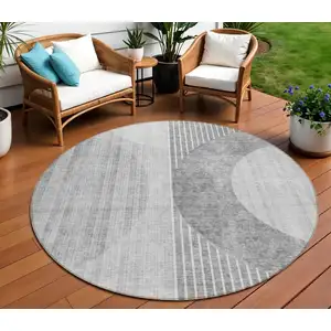 Photo of 8' Gray Silver And Charcoal Round Geometric Washable Indoor Outdoor Area Rug