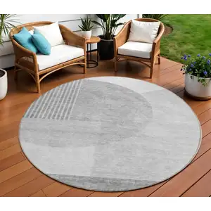 Photo of 8' Gray Silver And Ivory Round Geometric Washable Indoor Outdoor Area Rug