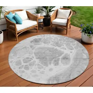 Photo of 8' Gray Silver And Ivory Round Nautical Washable Indoor Outdoor Area Rug