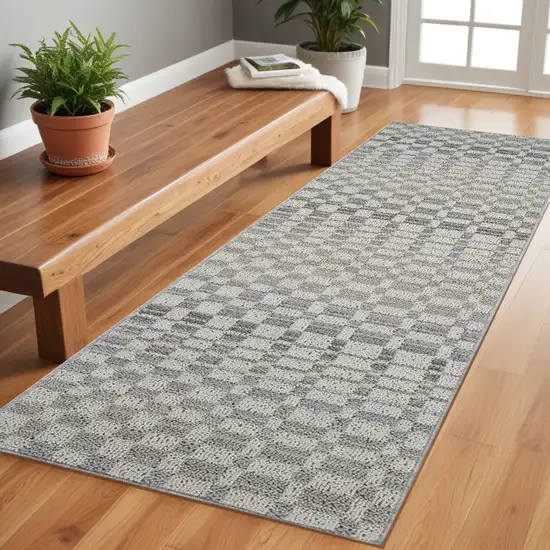 8' Gray and Beige Checkered Distressed Area Rug Photo 1