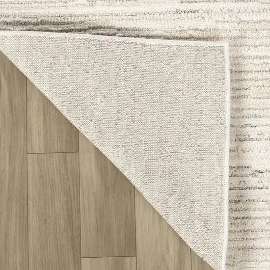 8' Gray and Beige Geometric Distressed Area Rug Photo 5