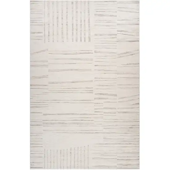 8' Gray and Beige Geometric Distressed Area Rug Photo 2