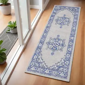 Photo of 6' Gray and Blue Floral Runner Rug