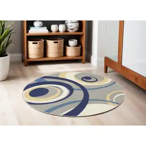 Photo of 5' Gray and Blue Round Geometric Power Loom Area Rug