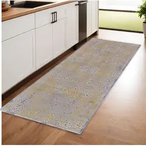 Photo of 8' Gray and Gold Oriental Power Loom Worn Faded Runner Rug