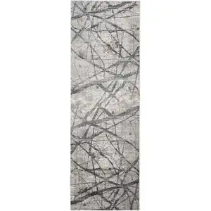 Photo of 8' Gray and Ivory Abstract Power Loom Distressed Runner Rug