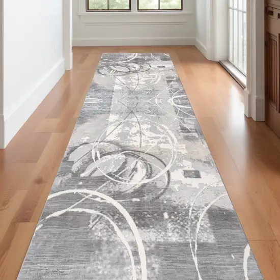 10' Gray and Ivory Abstract Power Loom Distressed Runner Rug Photo 1