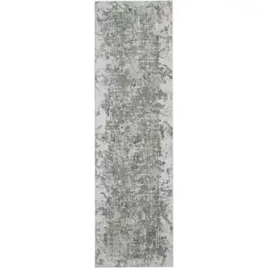 Photo of 8' Gray and Ivory Abstract Power Loom Worn Faded Runner Rug