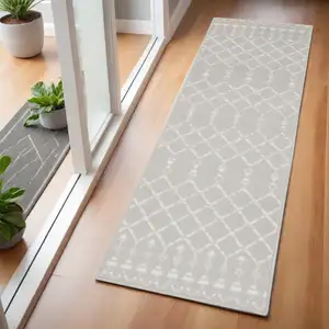 Photo of 6' Gray and Ivory Geometric Runner Rug