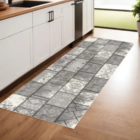 13' Gray and Ivory Geometric Washable Non Skid Runner Rug Photo 1