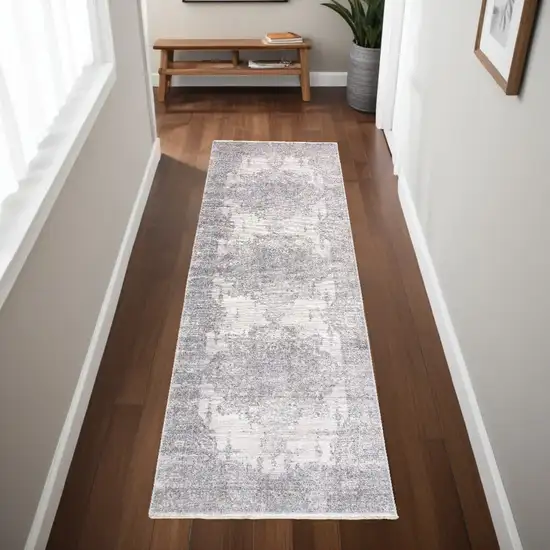 8' Gray and Ivory Medallion Power Loom Distressed Runner Rug with Fringe Photo 1