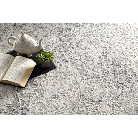 10' Gray and Ivory Oriental Distressed Runner Rug Photo 4