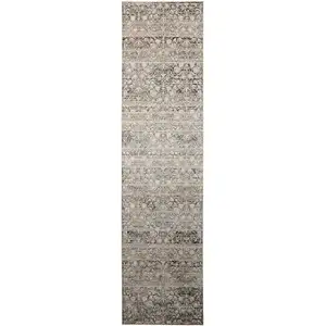 Photo of 10' Gray and Ivory Oriental Power Loom Distressed Runner Rug With Fringe