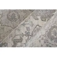 Photo of 8' Gray and Ivory Oriental Power Loom Worn Faded Runner Rug With Fringe