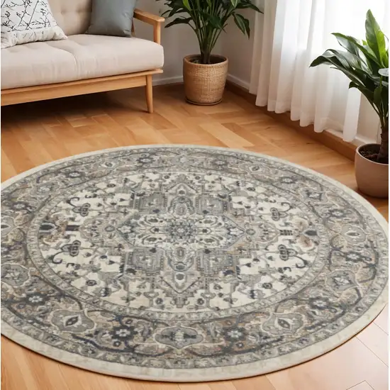 10' Gray and Ivory Round Medallion Power Loom Distressed Area Rug Photo 1