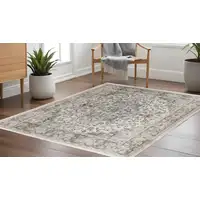 Photo of 10' Gray and Ivory Square Medallion Power Loom Distressed Area Rug