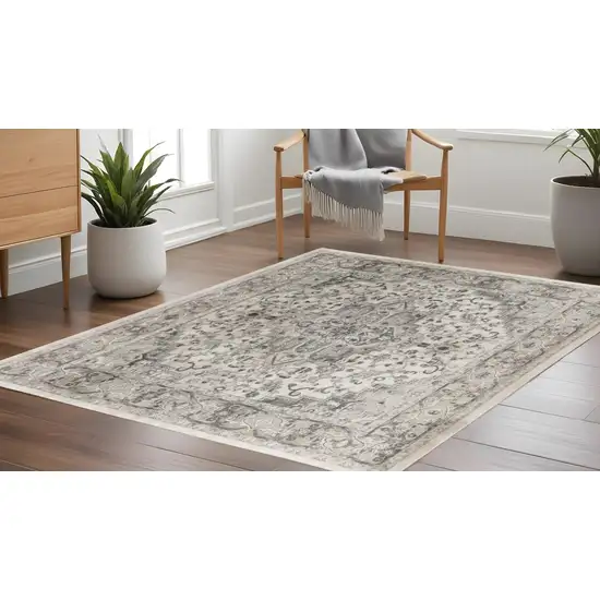 10' Gray and Ivory Square Medallion Power Loom Distressed Area Rug Photo 1