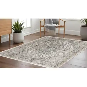 Photo of 10' Gray and Ivory Square Medallion Power Loom Distressed Area Rug