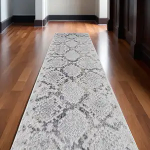 Photo of 10' Gray and Silver Floral Power Loom Runner Rug