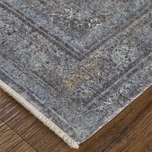 Photo of 8' Gray and Silver Oriental Power Loom Worn Faded Runner Rug