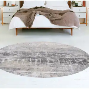 Photo of 5' Gray and White Round Abstract Non Skid Area Rug