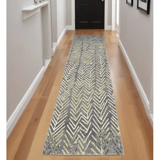 8' Gray and Yellow Geometric Power Loom Distressed Runner Rug Photo 1