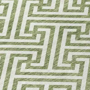 Photo of 8' Green And Beige Round Geometric Washable Indoor Outdoor Area Rug