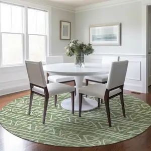 Photo of 8' Green And Ivory Round Geometric Washable Indoor Outdoor Area Rug